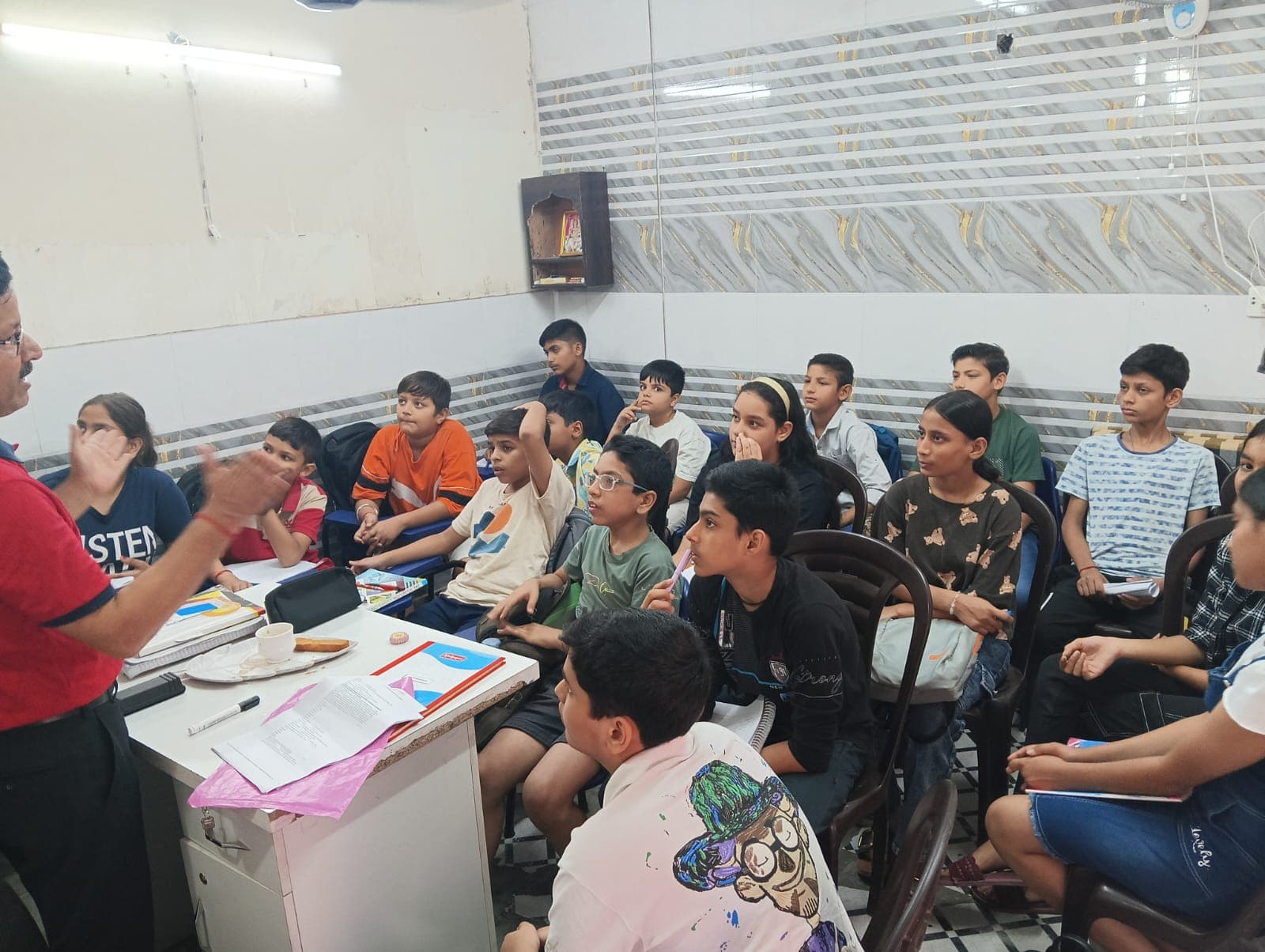 Teacher leading a discussion at ESA Rohini