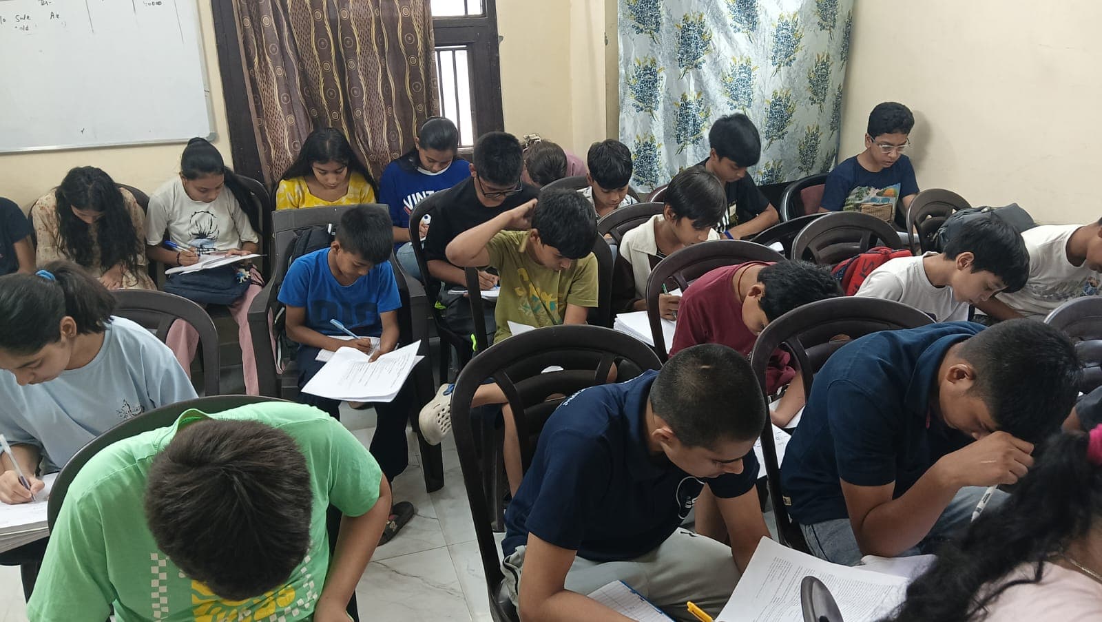 Middle-school students writing weekly test