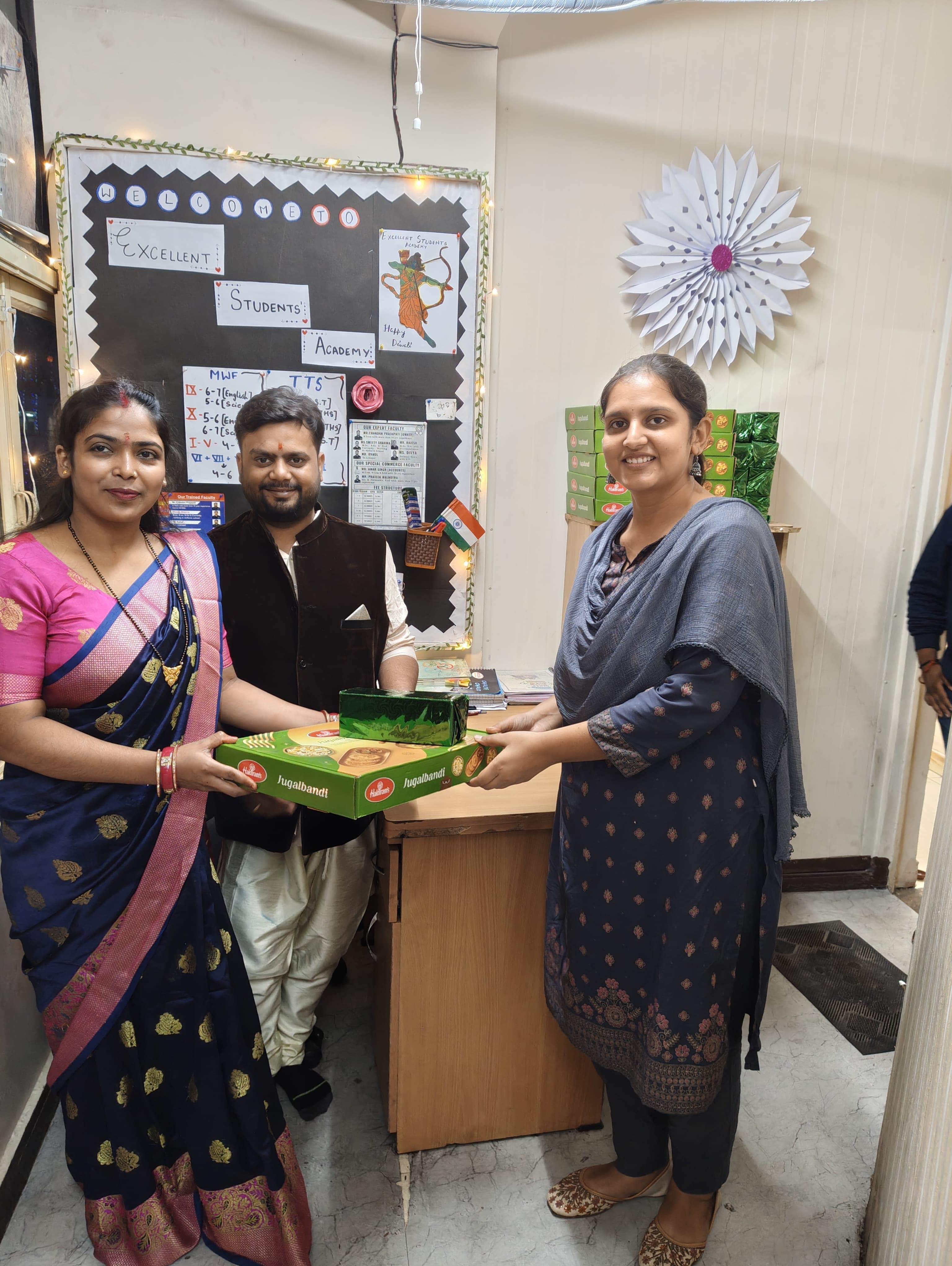 Faculty receiving sweets at ESA