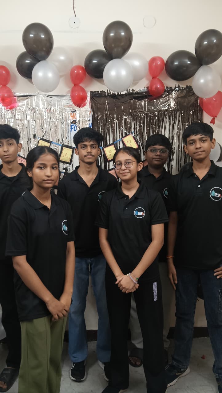 ESA batch students posing by decorated wall on Teachers' Day 2026