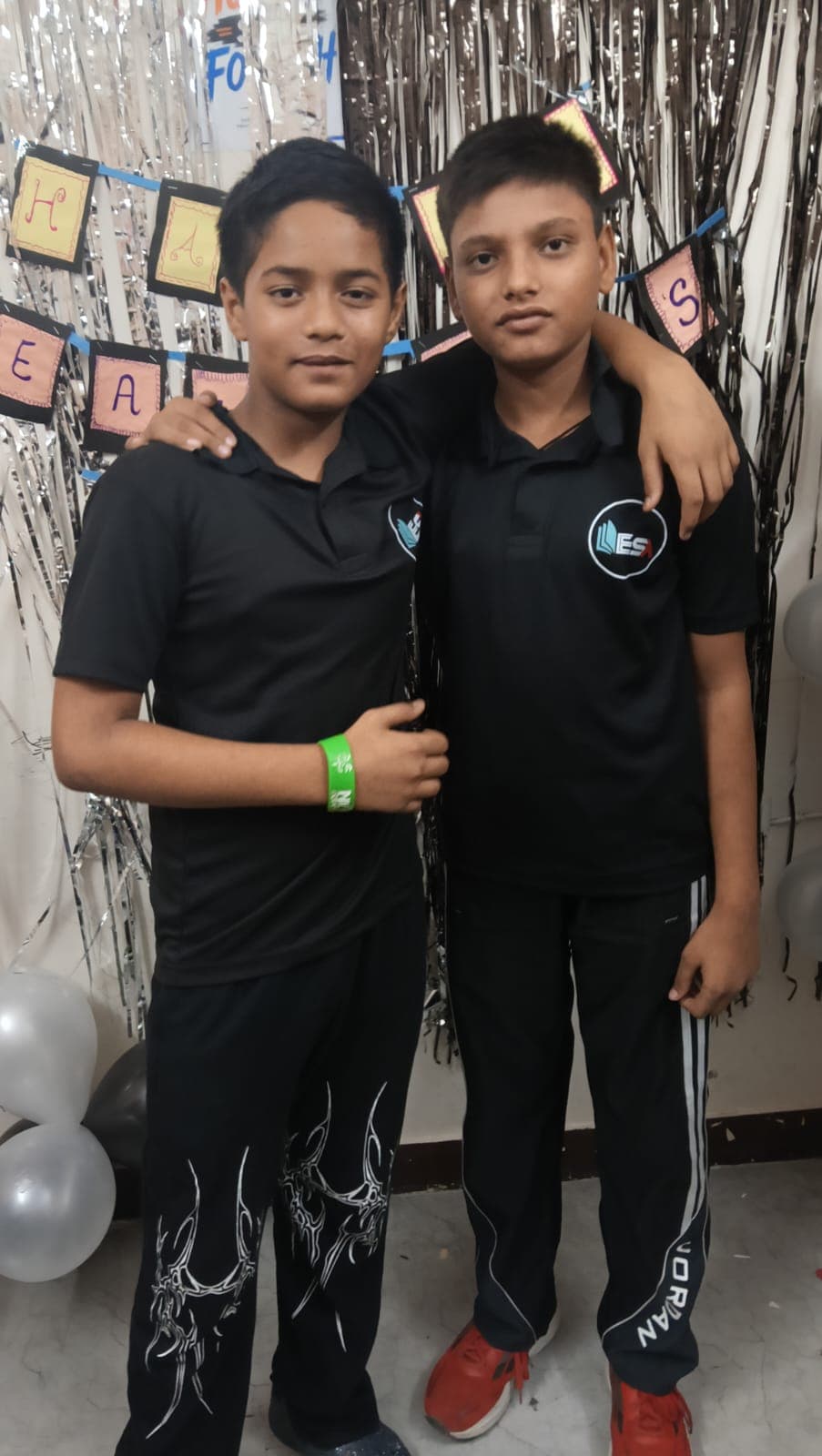 Two junior ESA students on Teachers' Day 2026 at Rohini