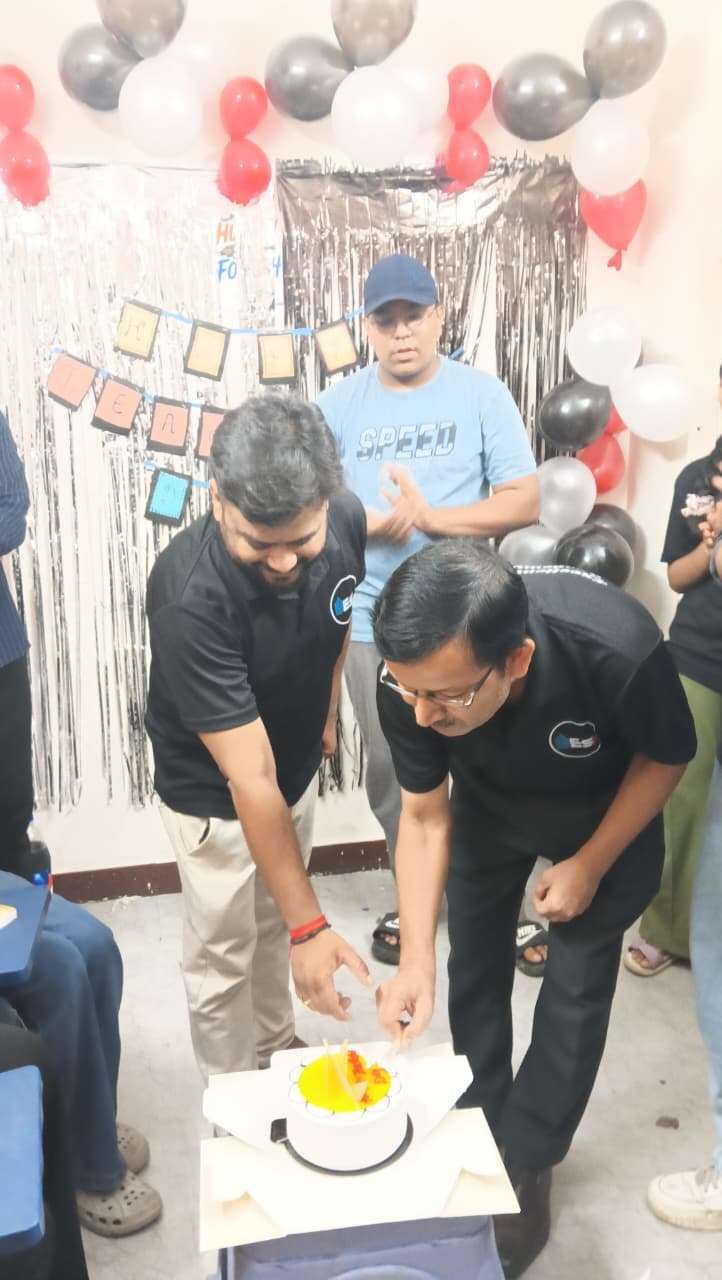 ESA faculty cutting the Teachers' Day 2026 cake at Rohini centre