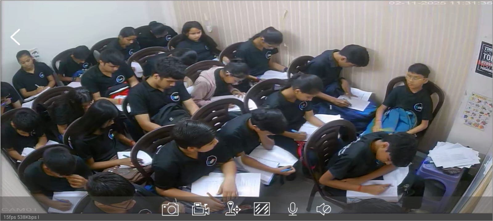 Students solving questions during weekly test