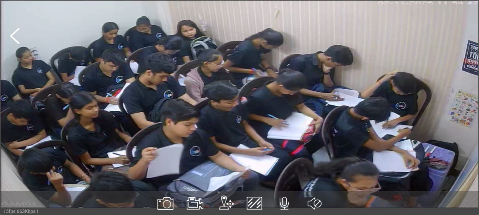 Students attempting weekly chapter test under invigilation